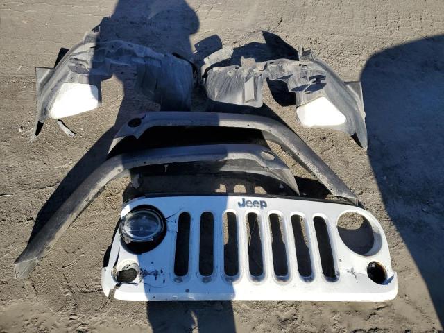 Photo 12 from auction – 2011 JEEP WRANGLER U with VIN 1J4BA3H12BL609543