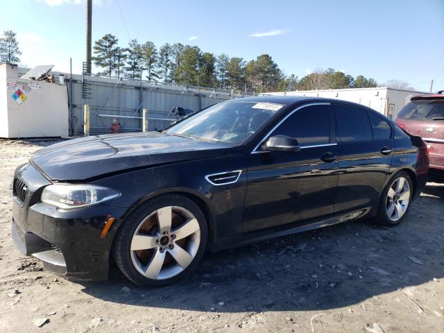 BMW M5 2015 with VIN WBSFV9C57FD594703 - Photo from auction