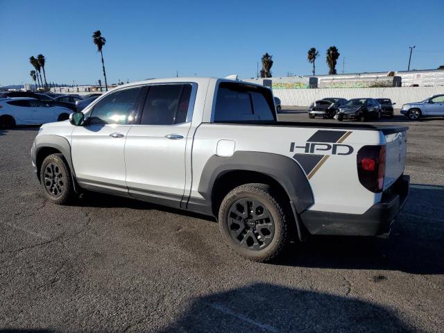 Photo 2 from auction – 2022 HONDA RIDGELINE with VIN 5FPYK3F75NB006458