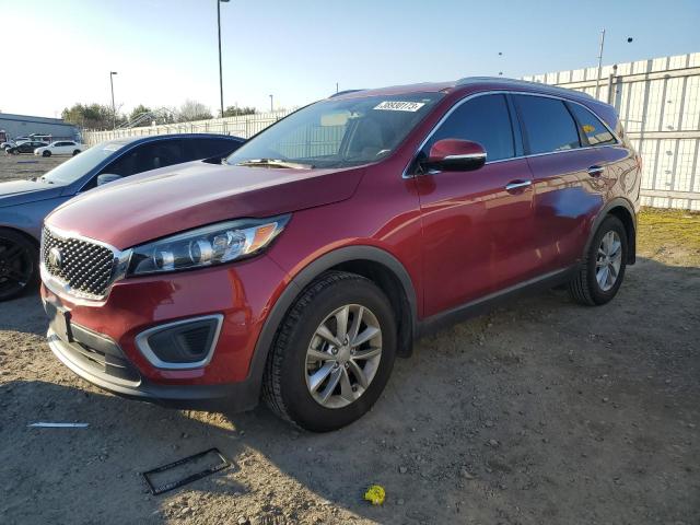 KIA SORENTO LX 2016 with VIN 5XYPG4A35GG143735 - Photo from auction