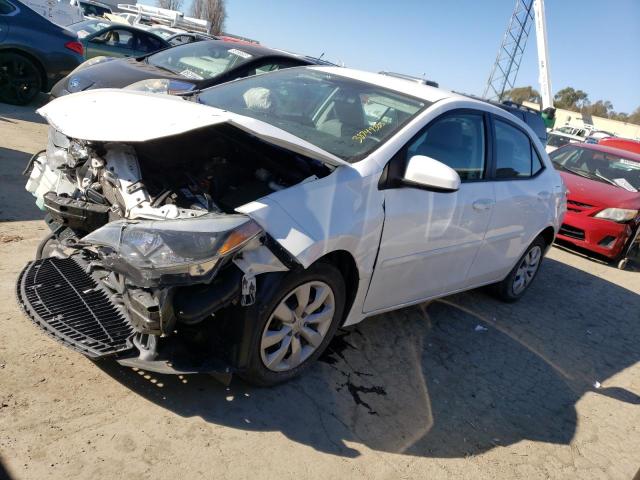 TOYOTA COROLLA L 2015 with VIN 5YFBURHE9FP318795 - Photo from auction