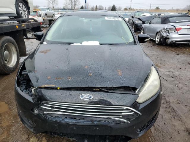 Photo 5 from auction – 2016 FORD FOCUS TITA with VIN 1FADP3N29GL309585