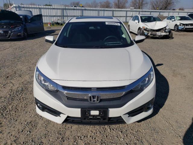 Photo 5 from auction – 2017 HONDA CIVIC EX with VIN 2HGFC1F38HH652818
