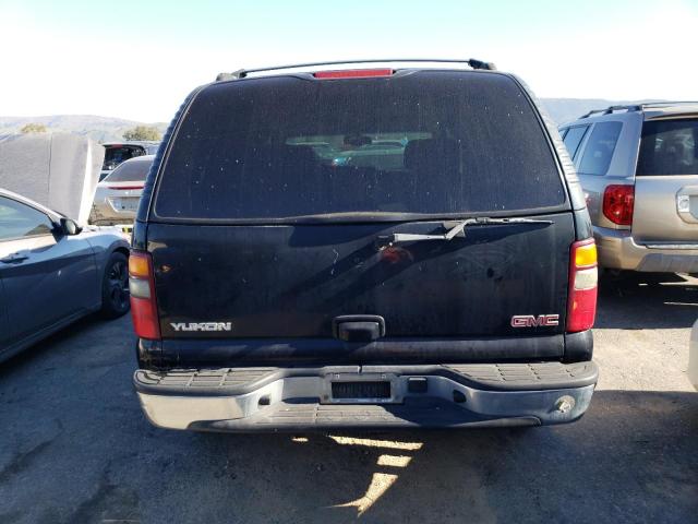 Photo 6 from auction – 2003 GMC YUKON with VIN 1GKEC13V93J268042