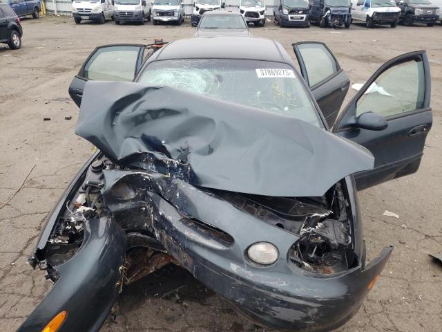 Photo 11 from auction – 1999 FORD TAURUS SE with VIN 1FAFP53U8XG131556