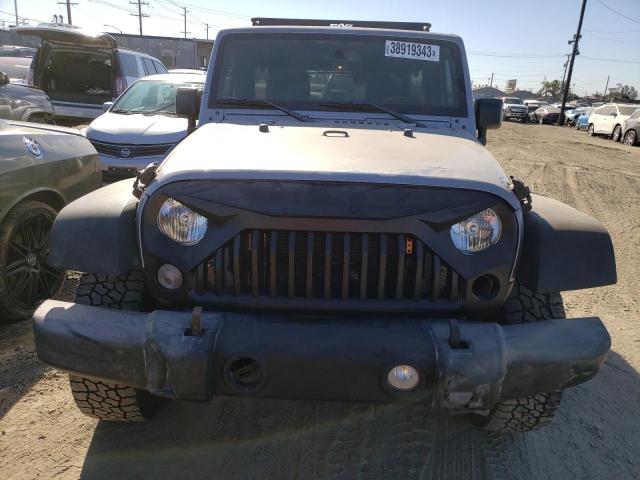 Photo 5 from auction – 2016 JEEP WRANGLER U with VIN 1C4BJWDG3GL121551