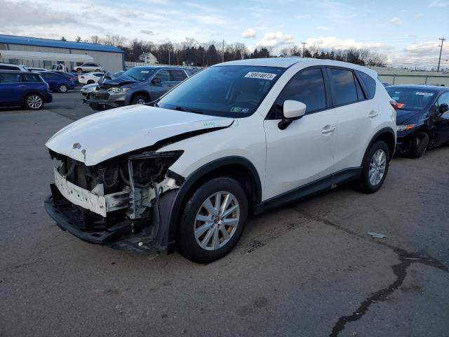 MAZDA CX-5 TOURI 2013 with VIN JM3KE4CE2D0141884 - Photo from auction