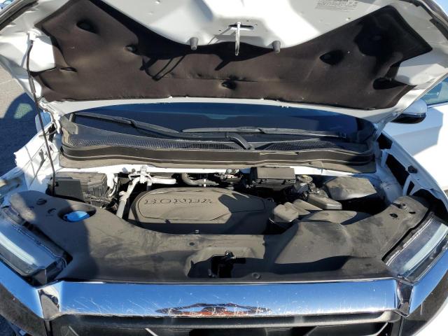 Photo 11 from auction – 2022 HONDA RIDGELINE with VIN 5FPYK3F75NB006458