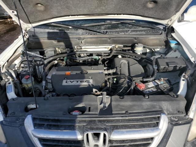 Photo 12 from auction – 2004 HONDA CR-V EX with VIN JHLRD78884C009275