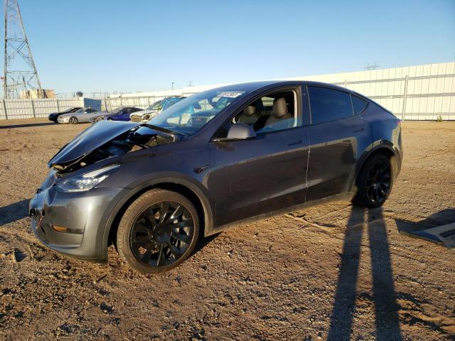 TESLA MODEL Y 2022 with VIN 7SAYGDEE5NF407852 - Photo from auction