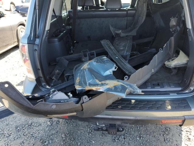 Photo 13 from auction – 2006 HONDA PILOT EX with VIN 2HKYF18716H559027