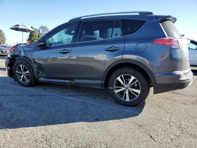 Photo 2 from auction – 2017 TOYOTA RAV4 XLE with VIN 2T3WFREVXHW390856