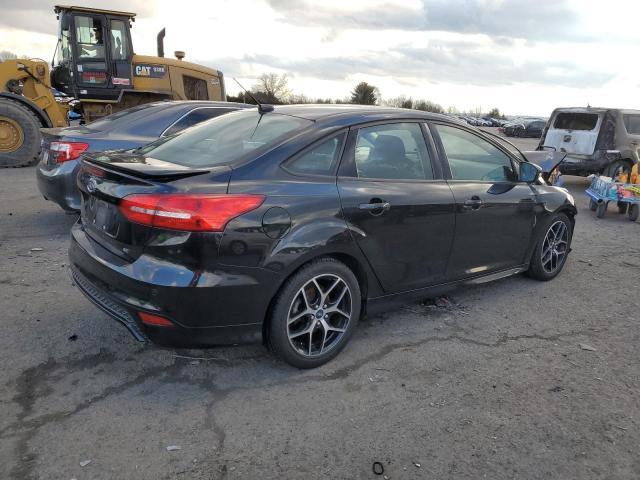 Photo 3 from auction – 2015 FORD FOCUS SE with VIN 1FADP3F22FL267306
