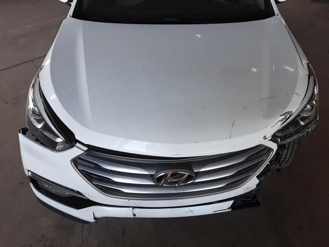 Photo 12 from auction – 2017 HYUNDAI SANTA FE S with VIN 5NMZU3LB4HH006938