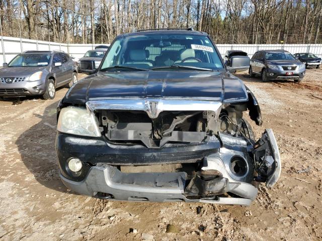 Photo 5 from auction – 2004 LINCOLN NAVIGATOR with VIN 5LMFU27RX4LJ34462