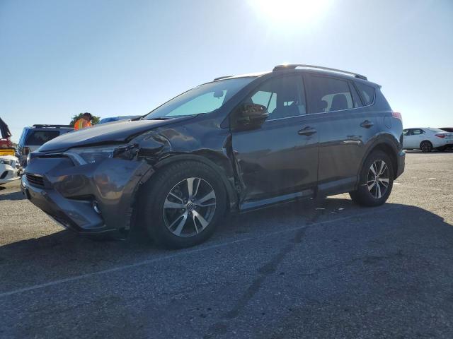 TOYOTA RAV4 XLE 2017 with VIN 2T3WFREVXHW390856 - Photo from auction