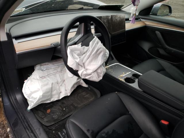 Photo 8 from auction – 2022 TESLA MODEL 3 with VIN 5YJ3E1EB9NF169439