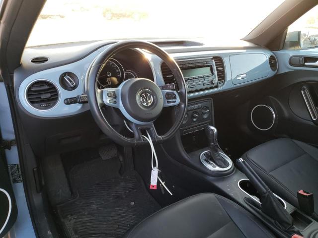 Photo 8 from auction – 2014 VOLKSWAGEN BEETLE with VIN 3VWJ17AT7EM660864
