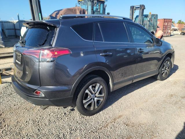 Photo 3 from auction – 2018 TOYOTA RAV4 LE with VIN JTMZFREV9JJ172246