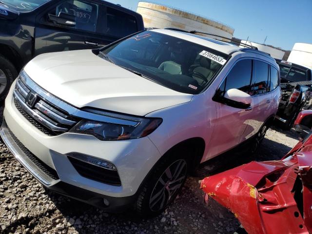 HONDA PILOT TOUR 2017 with VIN 5FNYF6H98HB000493 - Photo from auction