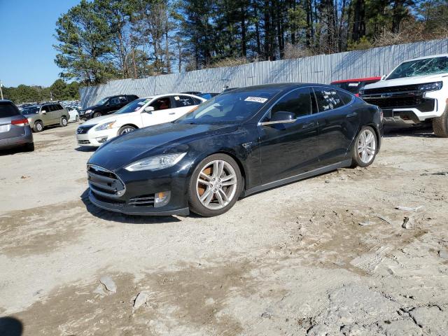 TESLA MODEL S 2013 with VIN 5YJSA1AC0DFP10642 - Photo from auction