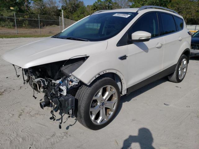 FORD ESCAPE TIT 2018 with VIN 1FMCU0J93JUD34270 - Photo from auction