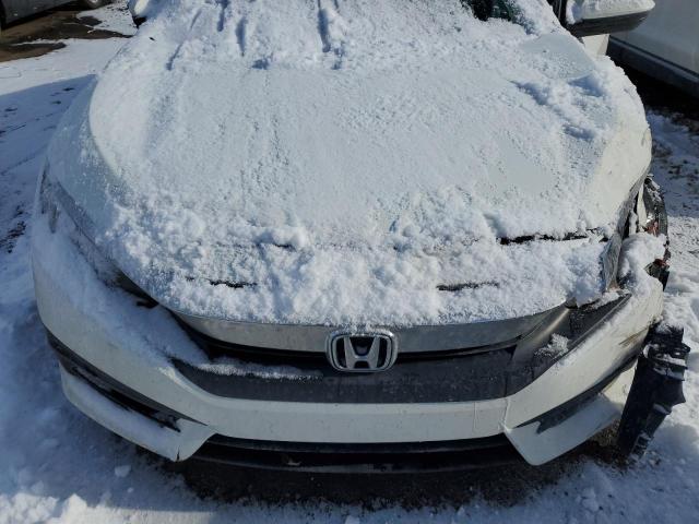 Photo 11 from auction – 2016 HONDA CIVIC LX with VIN 19XFC2F5XGE052236