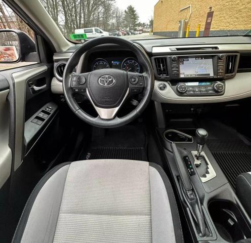 Photo 9 from auction – 2017 TOYOTA RAV4 XLE with VIN 2T3RFREV3HW565672
