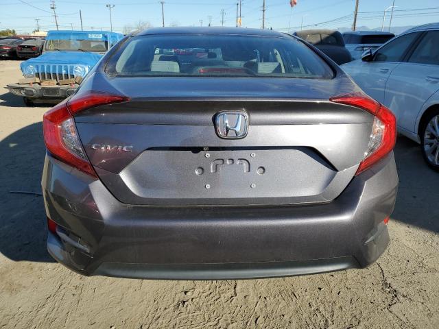 Photo 6 from auction – 2018 HONDA CIVIC LX with VIN 2HGFC2F50JH568053