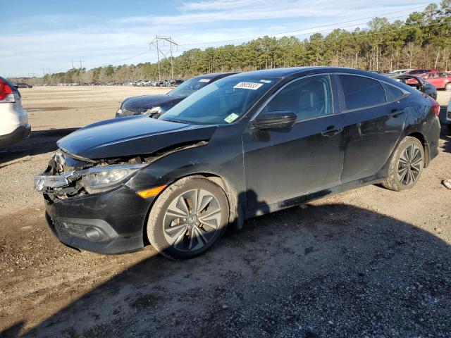 HONDA CIVIC EXL 2017 with VIN 19XFC1F74HE004311 - Photo from auction