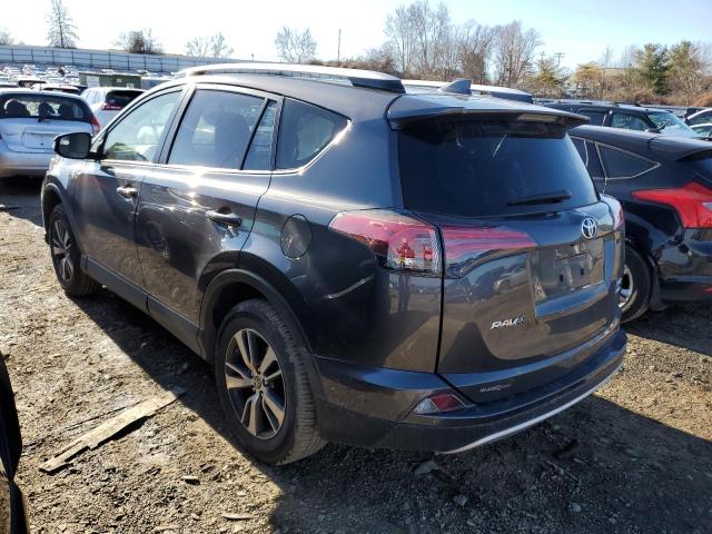 Photo 2 from auction – 2016 TOYOTA RAV4 XLE with VIN JTMRFREV3GJ104131
