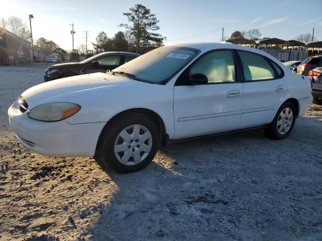 FORD TAURUS LX 2003 with VIN 1FAFP52U63A279560 - Photo from auction