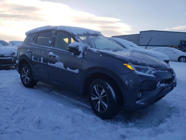 Photo 4 from auction – 2017 TOYOTA RAV4 XLE with VIN JTMRFREV7HJ712588