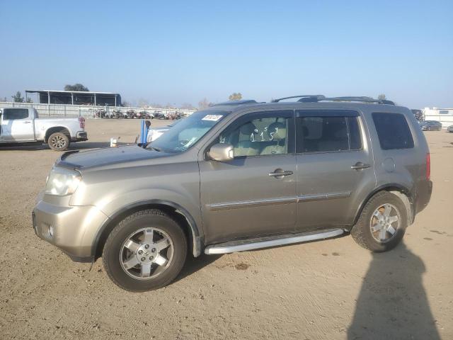 HONDA PILOT TOUR 2011 with VIN 5FNYF4H94BB072013 - Photo from auction