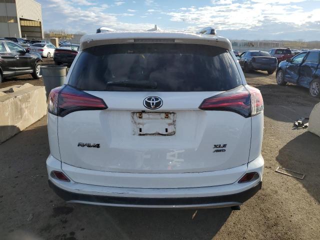 Photo 6 from auction – 2017 TOYOTA RAV4 XLE with VIN JTMRFREV7HJ715653
