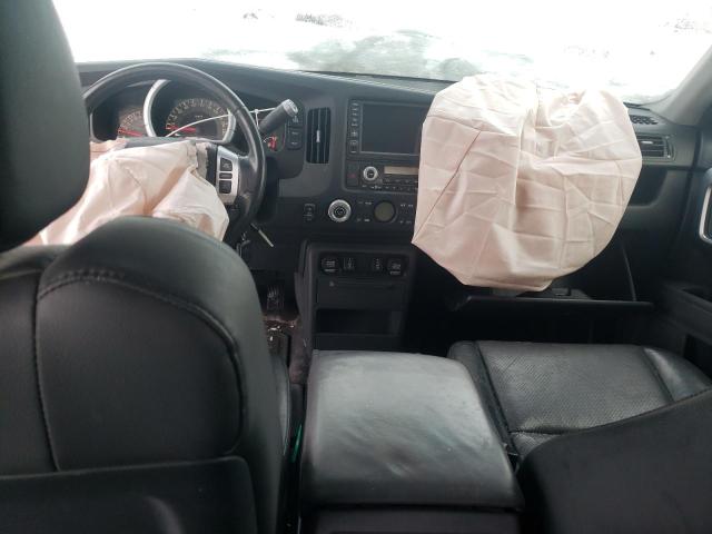 Photo 8 from auction – 2006 HONDA RIDGELINE with VIN 2HJYK16596H004053