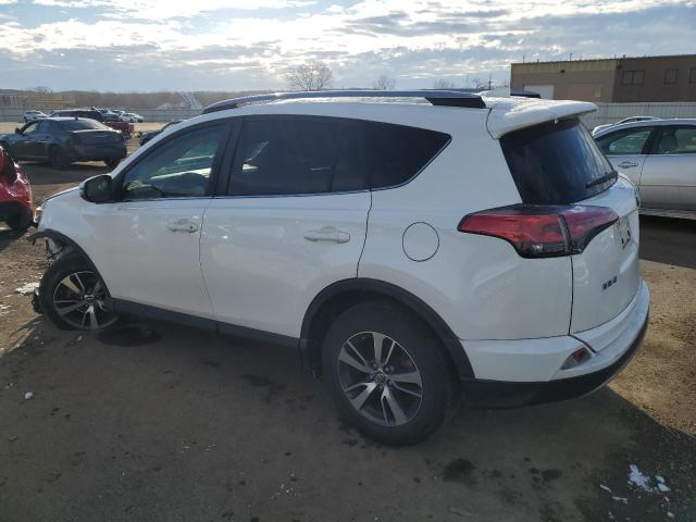 Photo 2 from auction – 2017 TOYOTA RAV4 XLE with VIN JTMRFREV7HJ715653