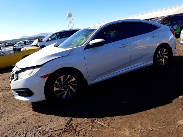 HONDA CIVIC EX 2018 with VIN 19XFC2F79JE018975 - Photo from auction