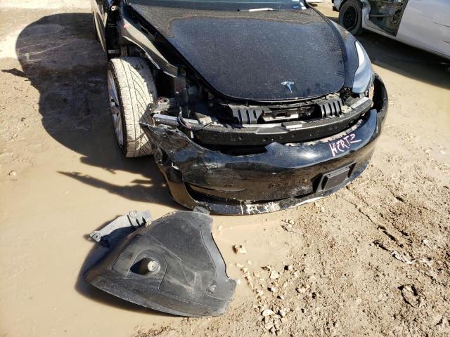 Photo 12 from auction – 2022 TESLA MODEL 3 with VIN 5YJ3E1EAXNF191117