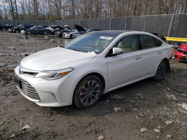 TOYOTA AVALON HYB 2016 with VIN 4T1BD1EB7GU052270 - Photo from auction