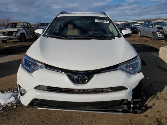 Photo 5 from auction – 2017 TOYOTA RAV4 XLE with VIN JTMRFREV7HJ715653