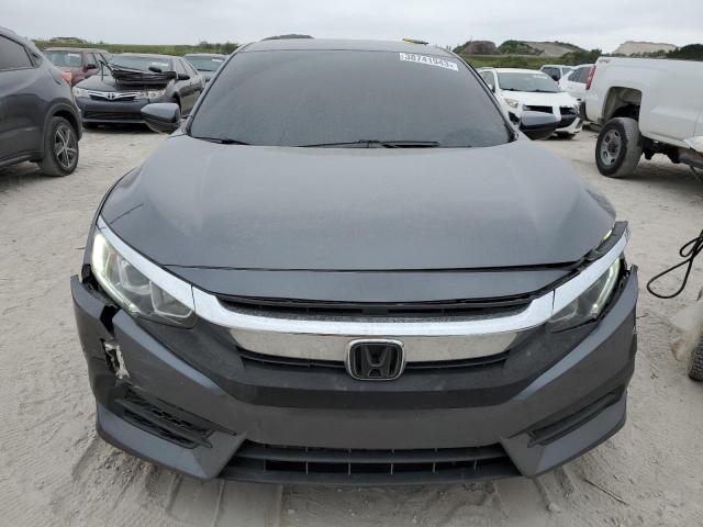 Photo 5 from auction – 2018 HONDA CIVIC LX with VIN 19XFC2F50JE042001