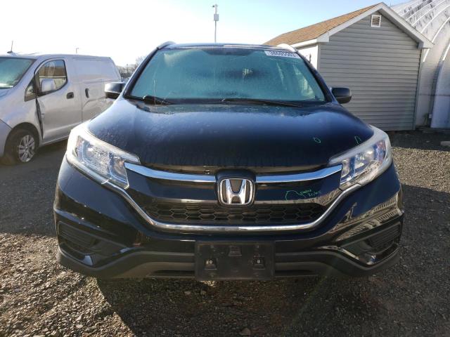 Photo 5 from auction – 2016 HONDA CR-V LX with VIN 2HKRM4H31GH624792