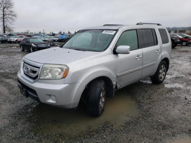 HONDA PILOT TOUR 2010 with VIN 5FNYF4H88AB017151 - Photo from auction