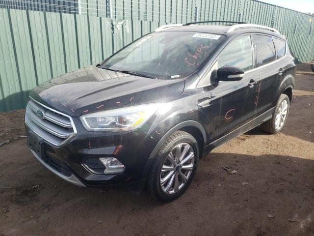 FORD ESCAPE TIT 2017 with VIN 1FMCU9JD3HUD19898 - Photo from auction