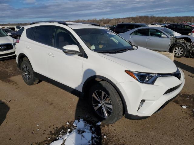 Photo 4 from auction – 2017 TOYOTA RAV4 XLE with VIN JTMRFREV7HJ715653