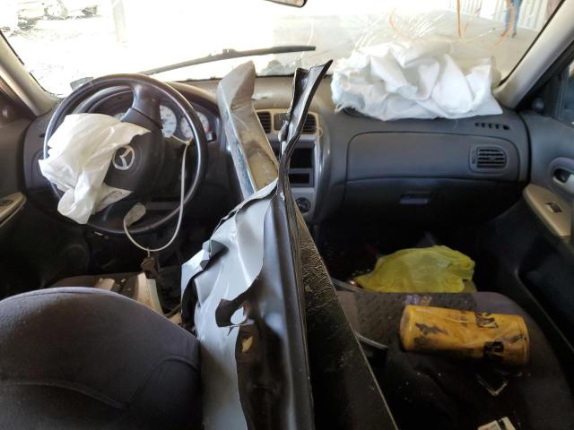 Photo 8 from auction – 2002 MAZDA PROTEGE PR with VIN JM1BJ246621526081