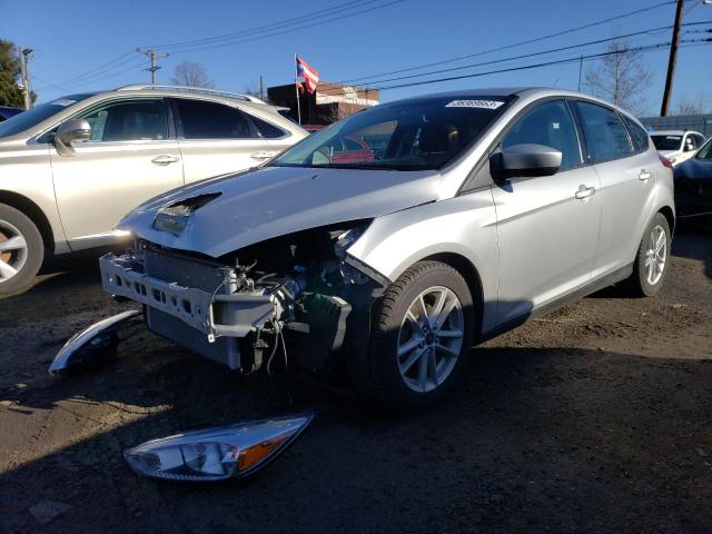 FORD FOCUS SE 2018 with VIN 1FADP3K22JL219240 - Photo from auction