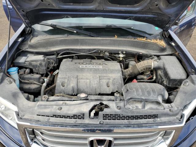 Photo 11 from auction – 2014 HONDA RIDGELINE with VIN 5FPYK1F57EB003208