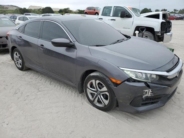 Photo 4 from auction – 2018 HONDA CIVIC LX with VIN 19XFC2F50JE042001